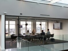 IMF–World Bank Meetings Face Pressure From War, Debt and Rising Energy Costs Illustrative photograph of a business meeting, not the IMF and World Bank annual meetings