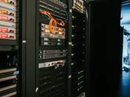 Rubrik Adds AI Code Security Tool to Project Hourglass, but Wider Rollout Is Still Pending Illustrative photograph of server racks in a data centre; photo by Kevin Ache, Unsplash